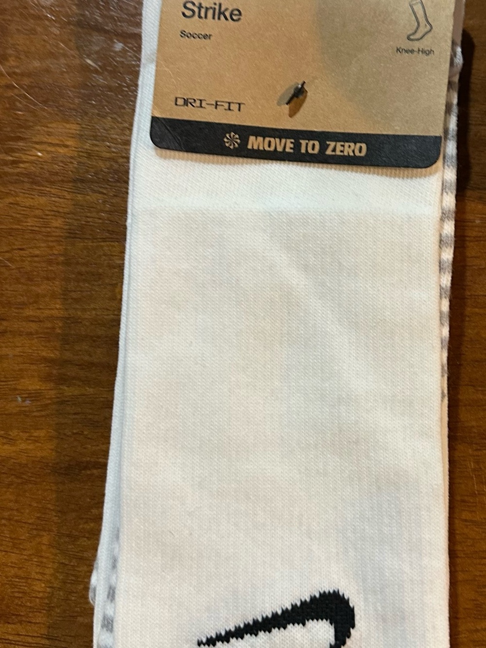 Nike White Athletic Knee-High Socks with Black Swoosh